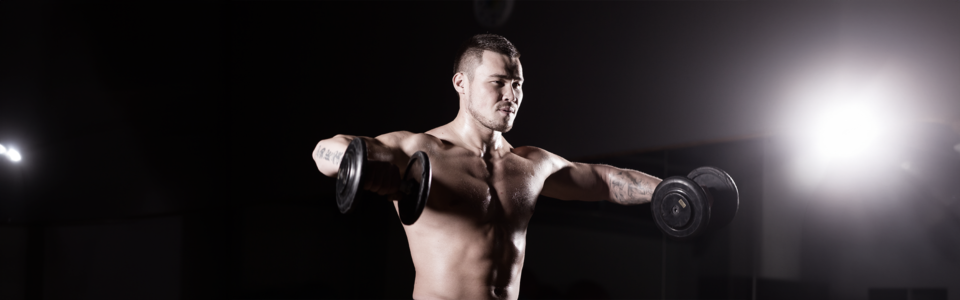 How to Do Dumbbell Lateral Raises: Form & Variations